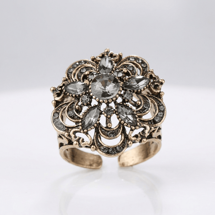 Anillo con Flor y Estallido y Cristal