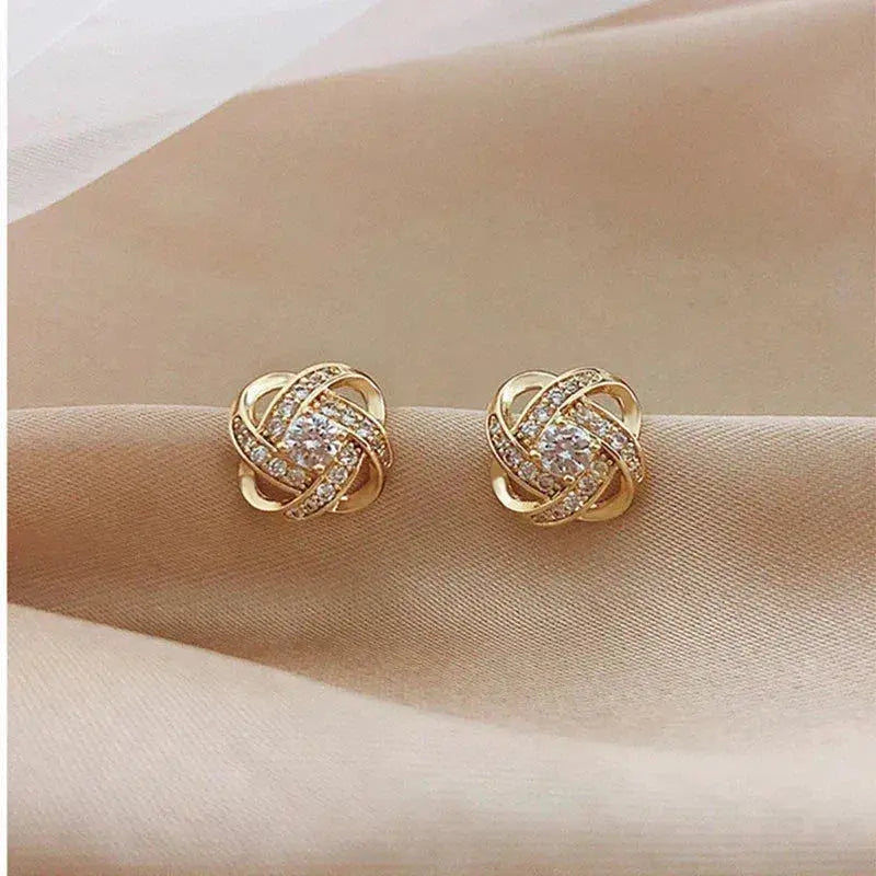 Pendientes Espiral Flor Dorados