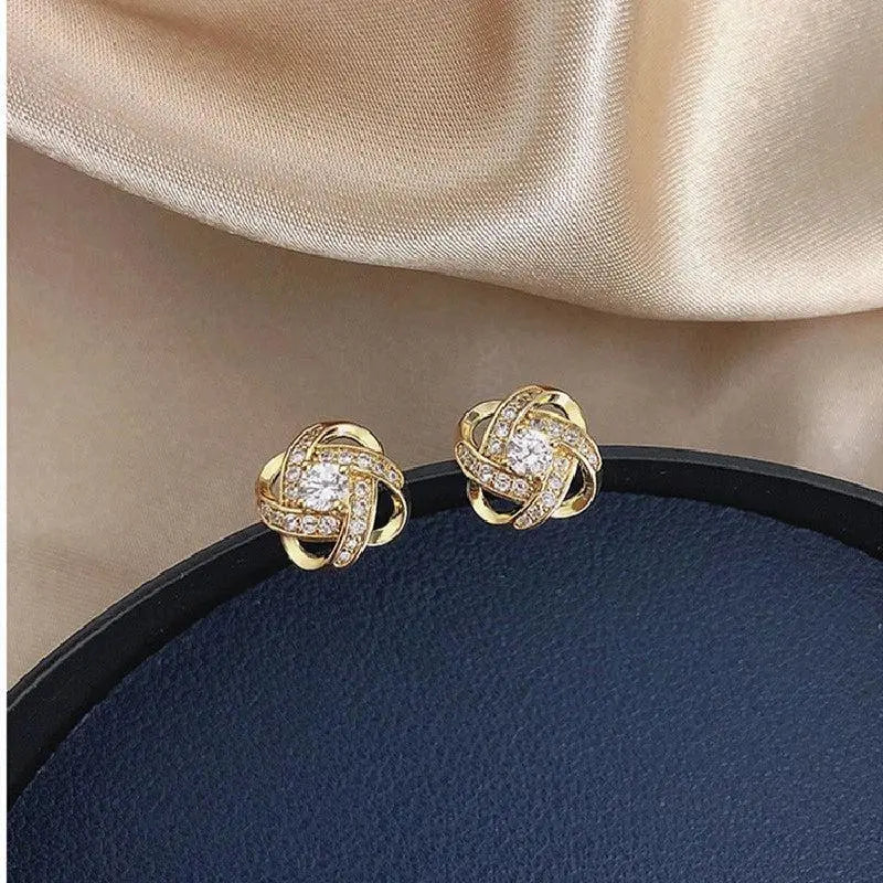 Pendientes Espiral Flor Dorados