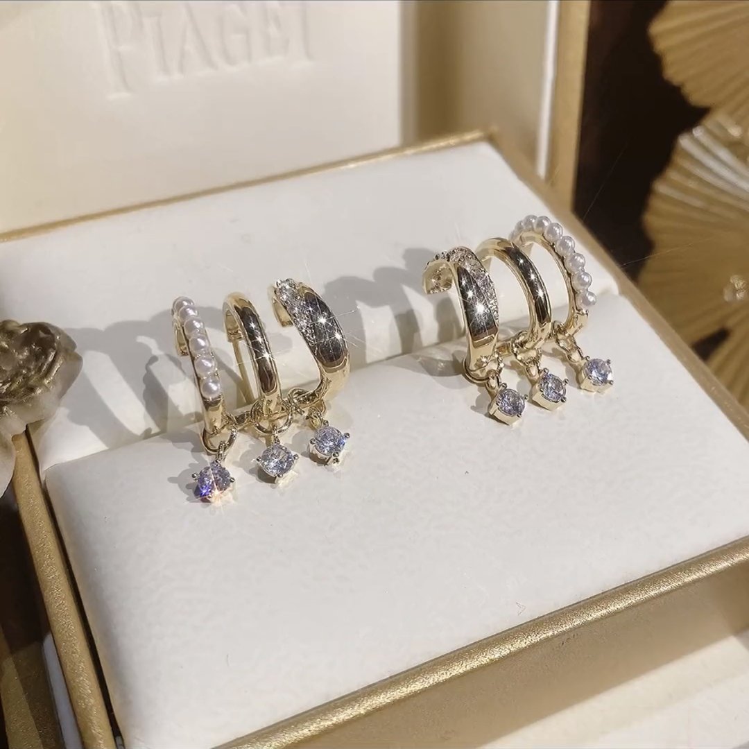 Pendientes superpuestos con circonitas incrustadas