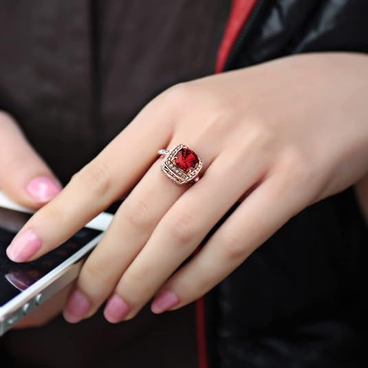Anillo llamativo halo de rubí Oro