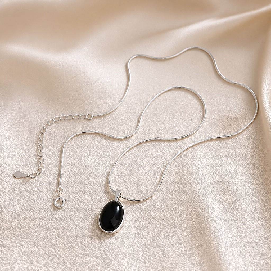 Collar Ovalado Negro Oro Blanco