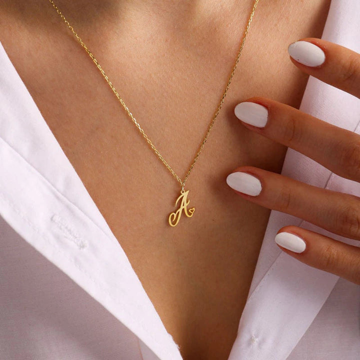 Collares con colgante de inicial