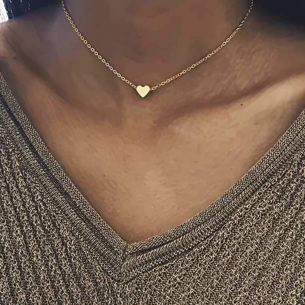 Colgante corazón de plata y oro