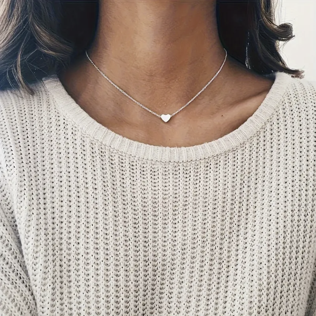 Colgante corazón de plata y oro
