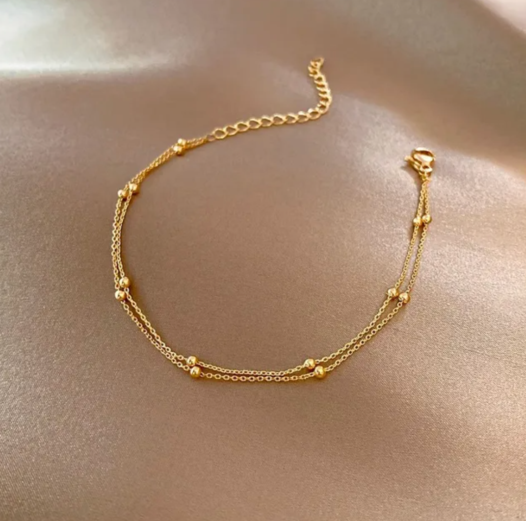 Hermosa pulsera dobledorada de con perlas