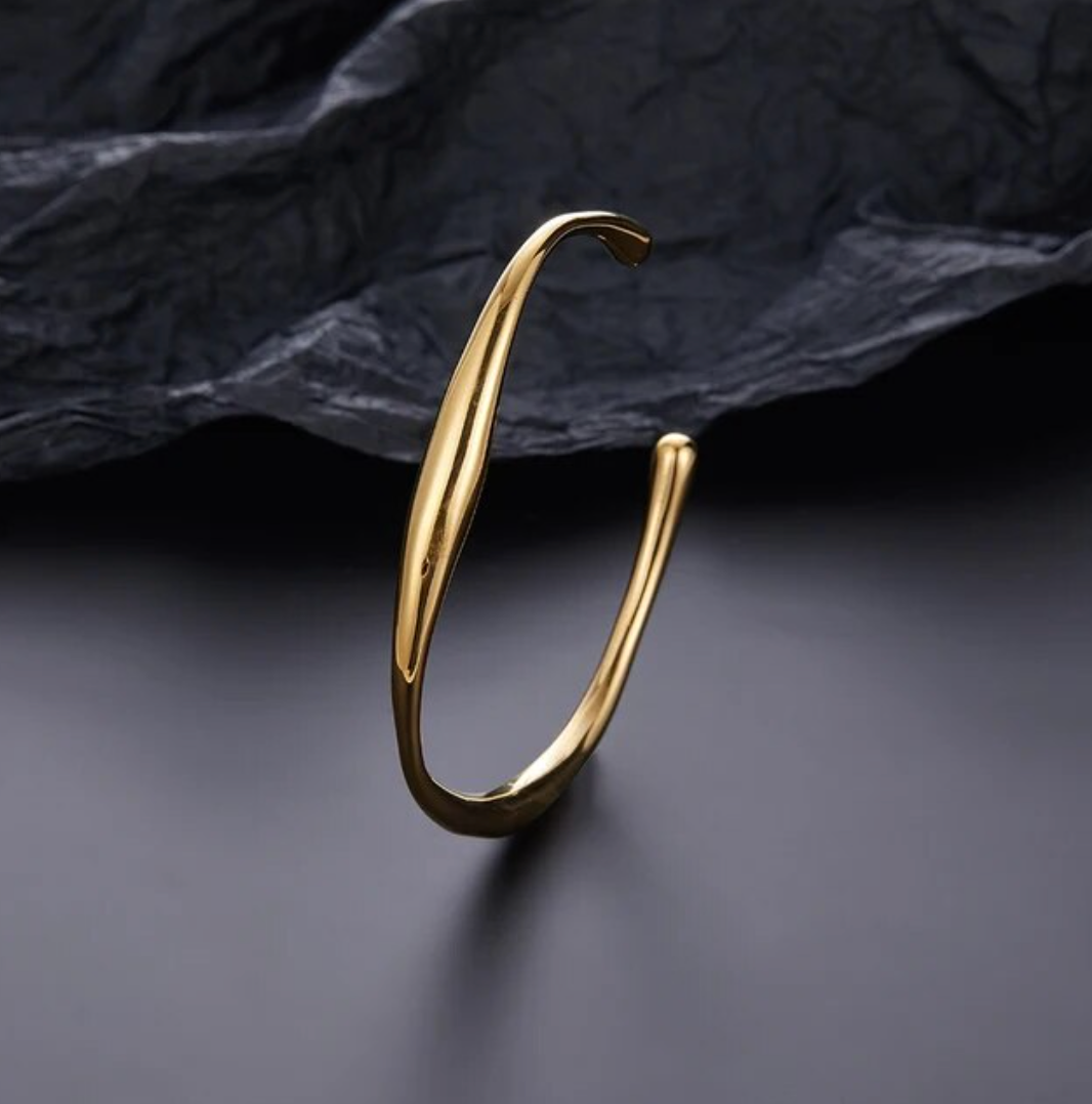 Pulsera fina de Oro con pequeña