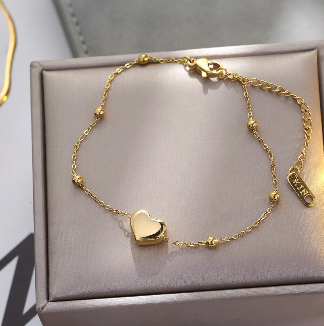 Pulsera de Oro con un corazón