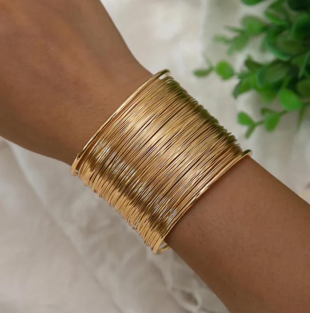 Pulsera gruesa de Oro en forma