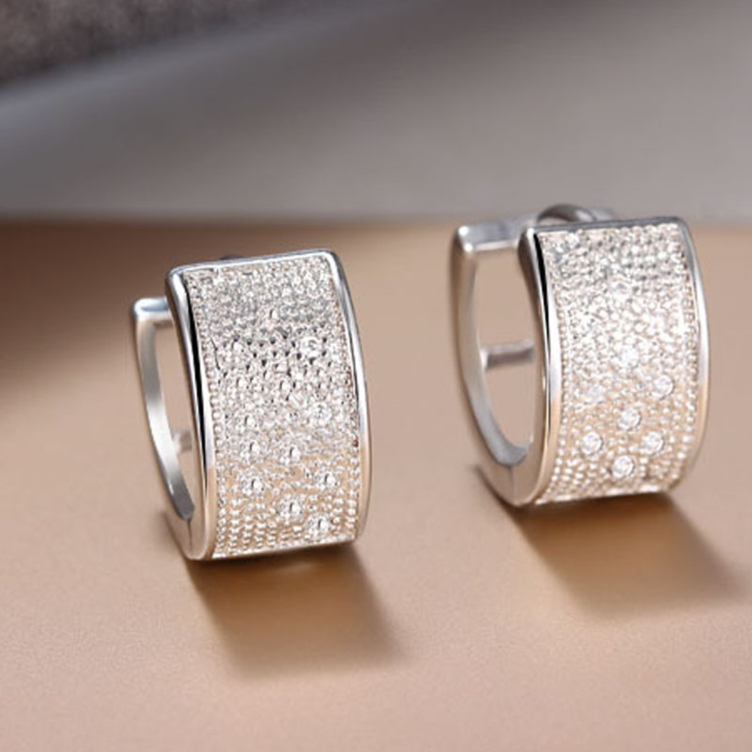Pendientes anchos grabados de Plata