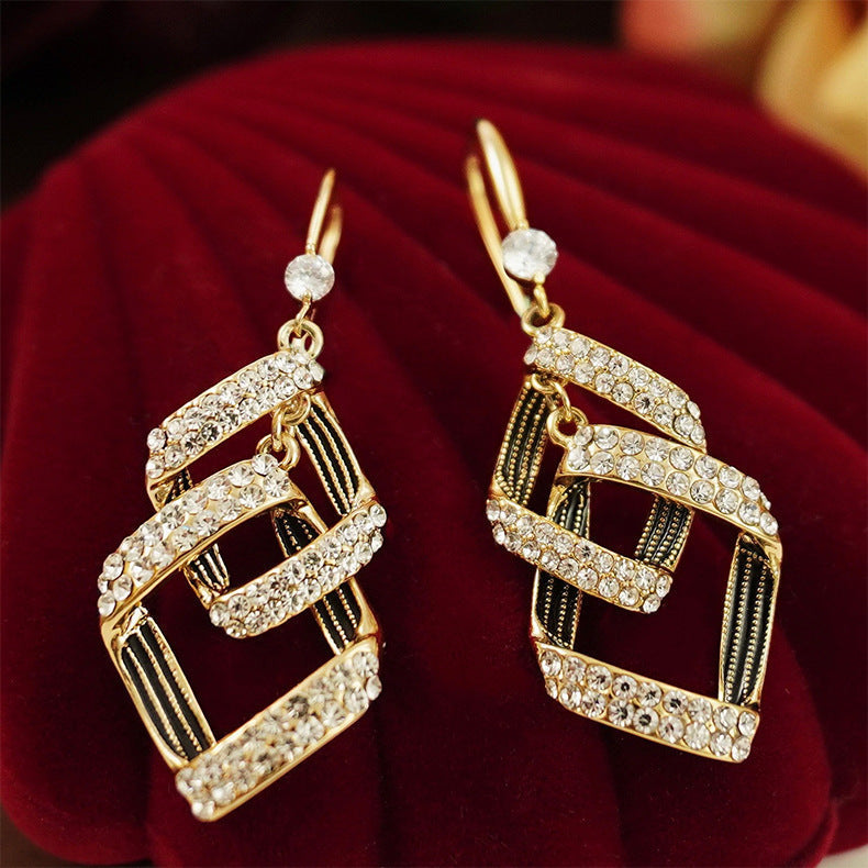 Pendientes Dorados en Capas