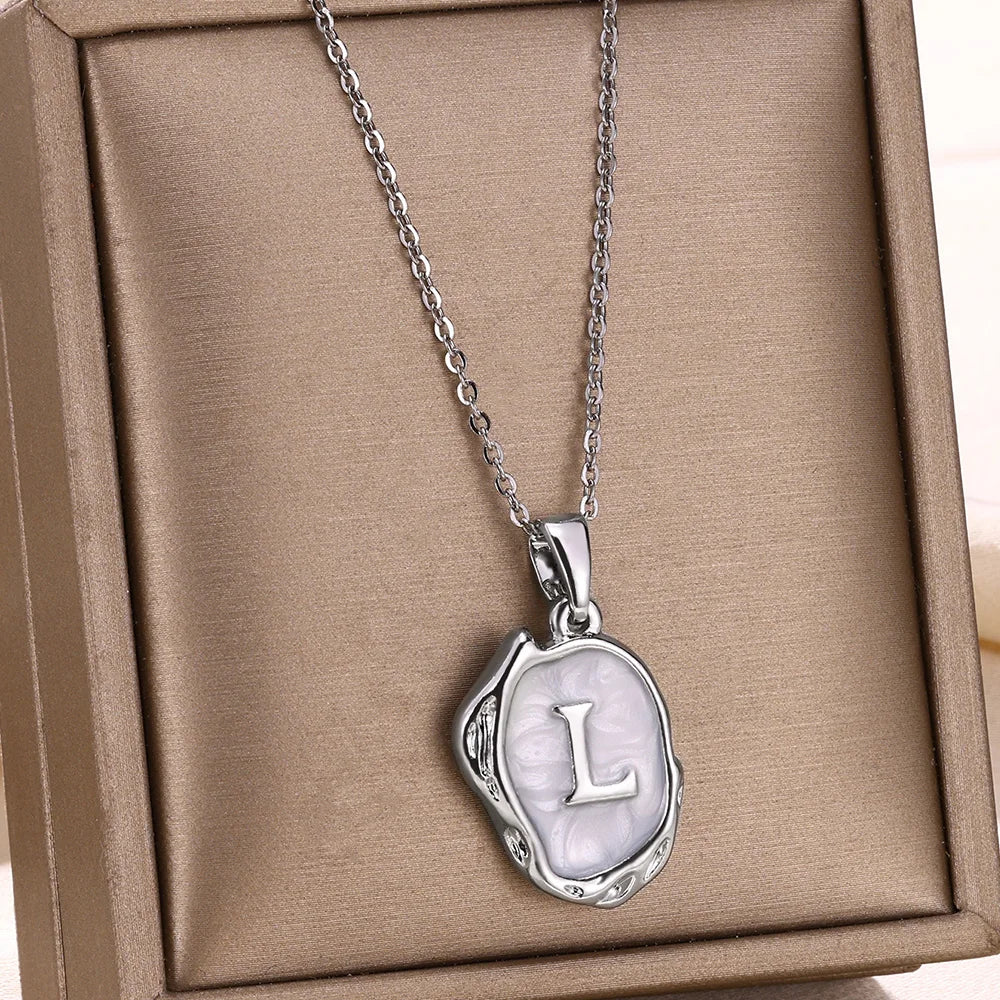 Collar océano con iniciales de Oro