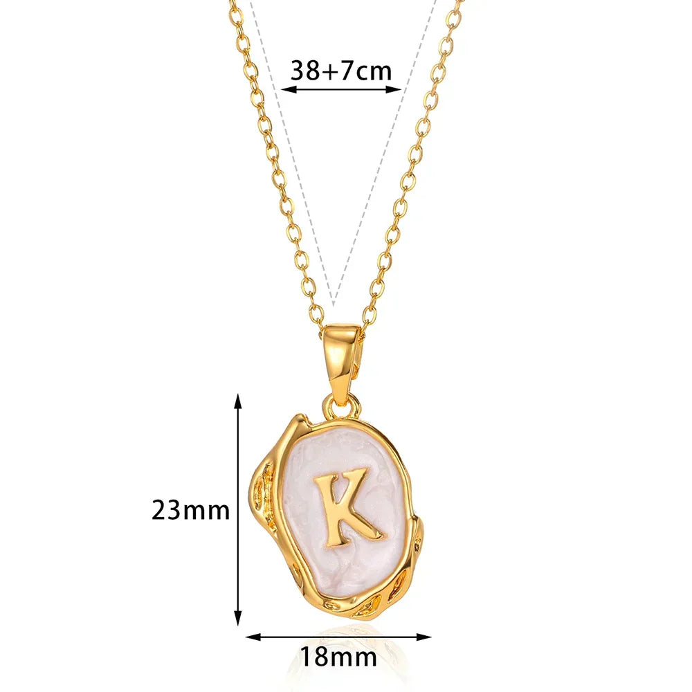Collar océano con iniciales de Oro