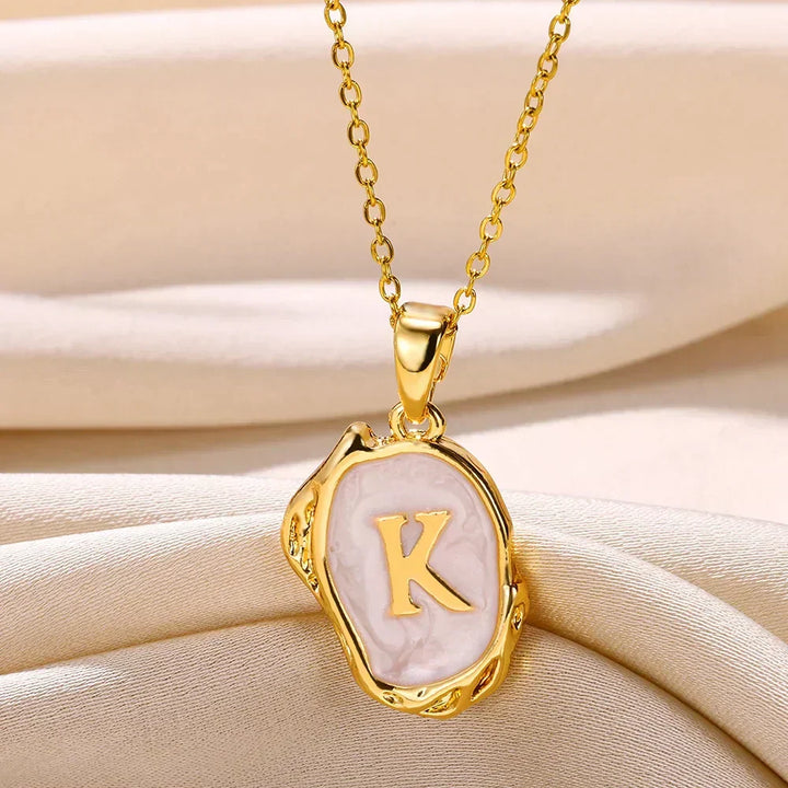 Collar océano con iniciales de Oro