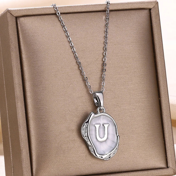 Collar océano con iniciales de Oro