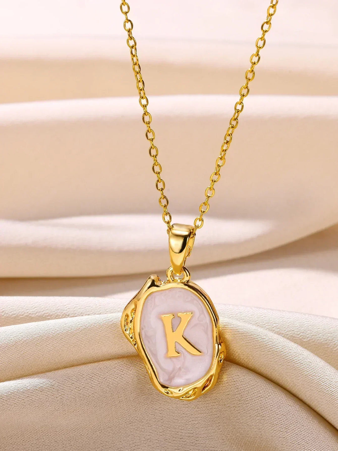 Collar océano con iniciales de Oro