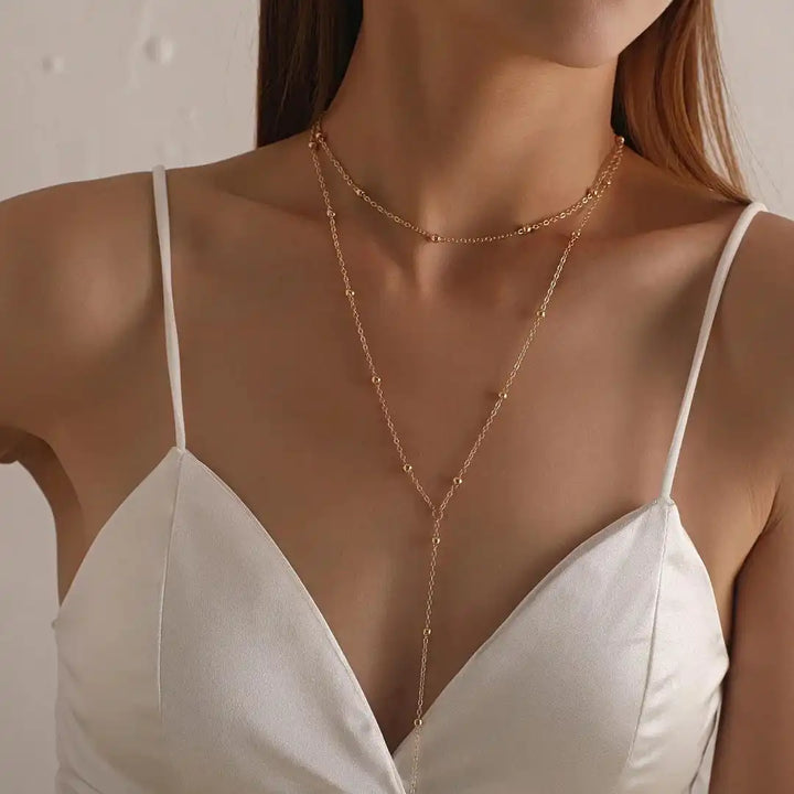 Collar Largo Dorado Doble Capa con Borla