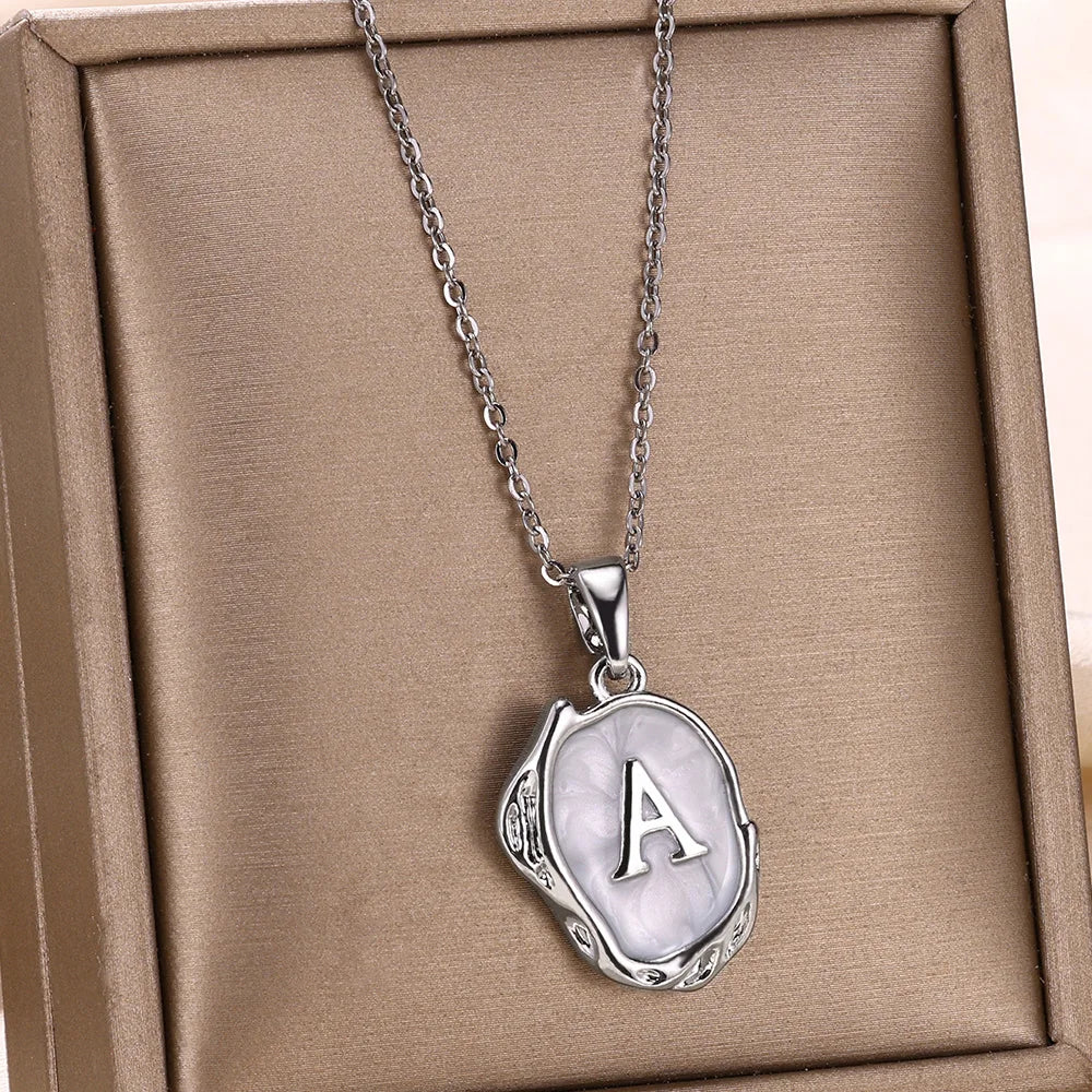 Collar océano con iniciales de Oro