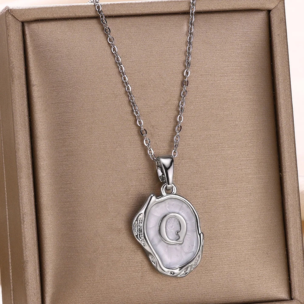 Collar océano con iniciales de Oro
