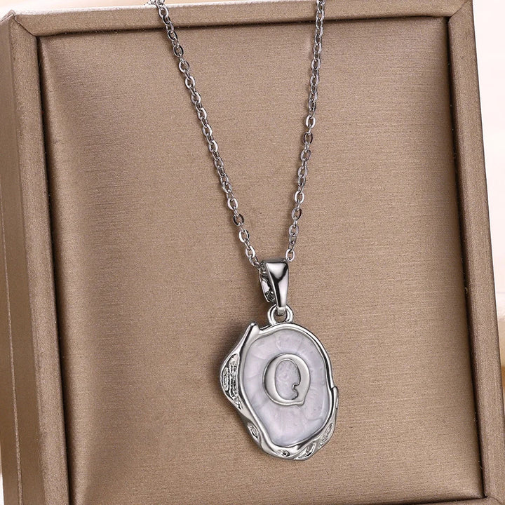 Collar océano con iniciales de Oro