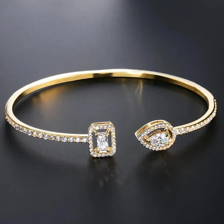 Brazalete Abierto Dorado Dos Piedras