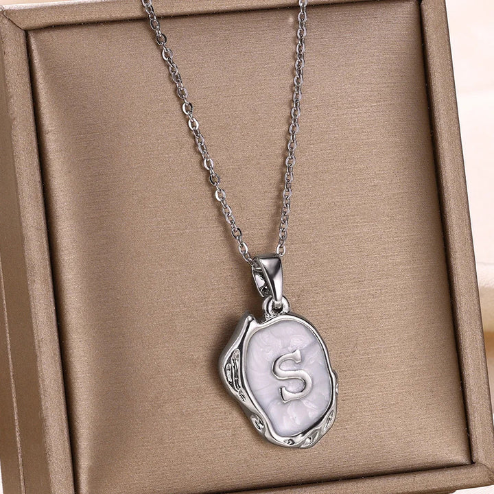 Collar océano con iniciales de Oro