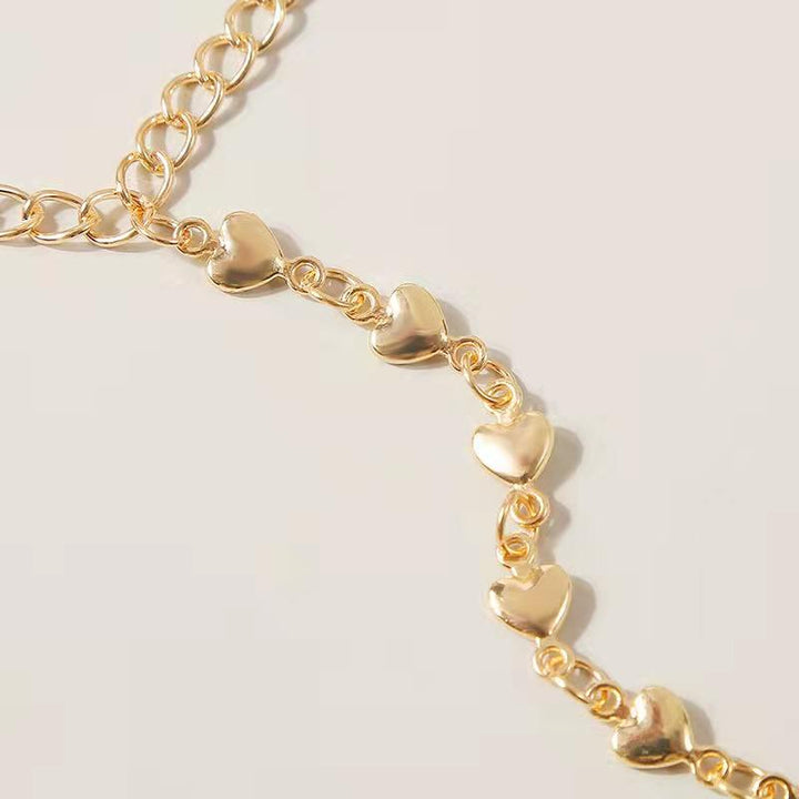 Pulsera de cadena para dedos Corazones
