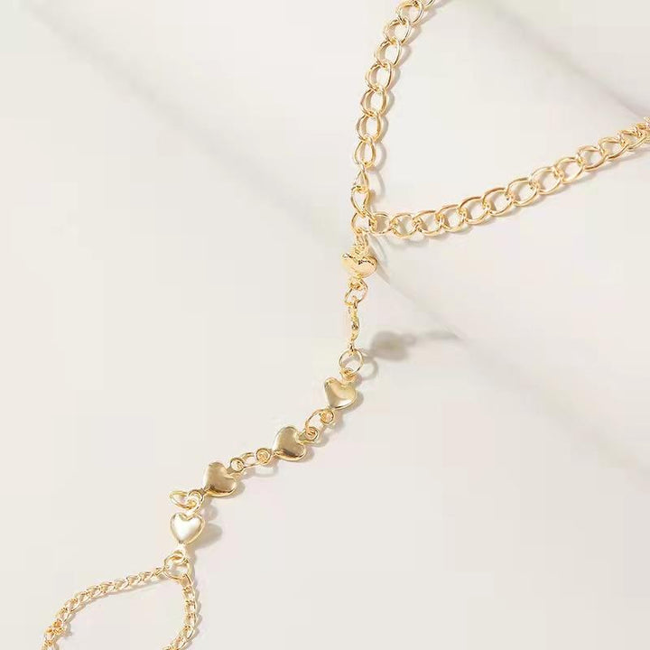 Pulsera de cadena para dedos Corazones
