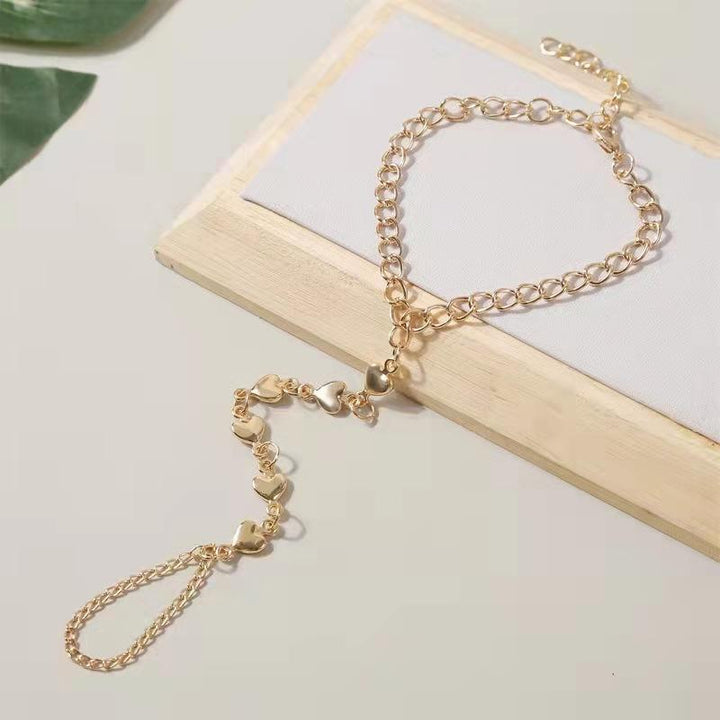 Pulsera de cadena para dedos Corazones