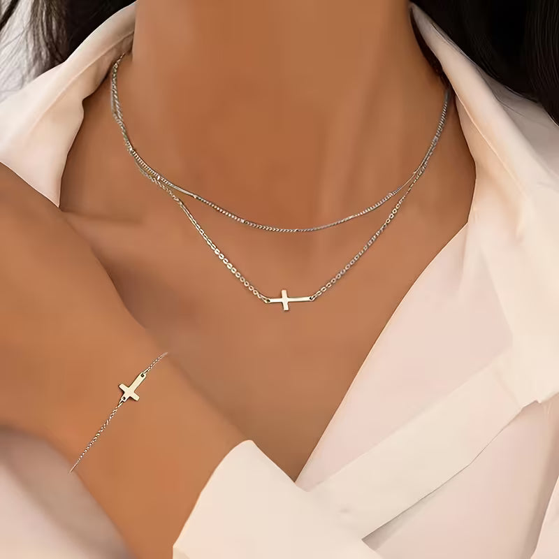Set de collar y brazalete Cruz