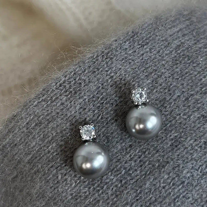 Elegantes pendientes de perlas negras