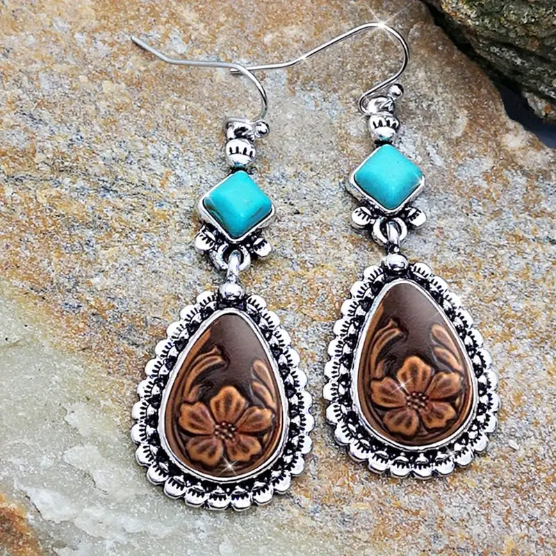 Pendientes de plata con flor