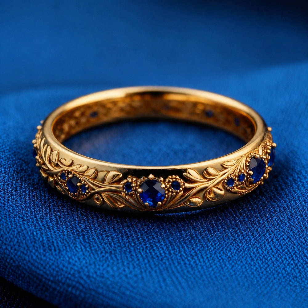 Anillo con Hoja y Circonita Azul