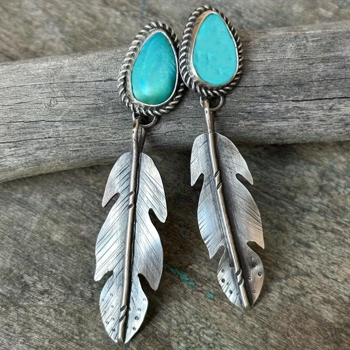 Pendientes Pluma Turquesa Plateados