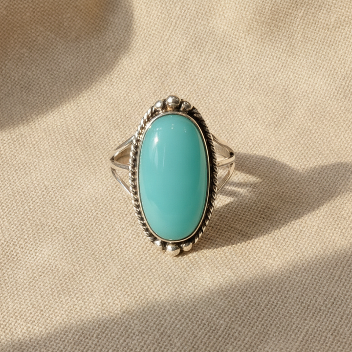 Anillo con Turquesa y Banda Trenzada